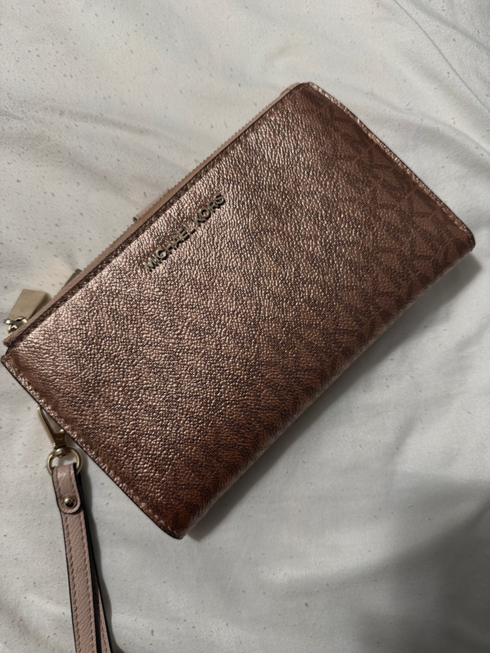 Michael Kors Rose Gold Metallic Signature Wristlet Wallet Selling for $27